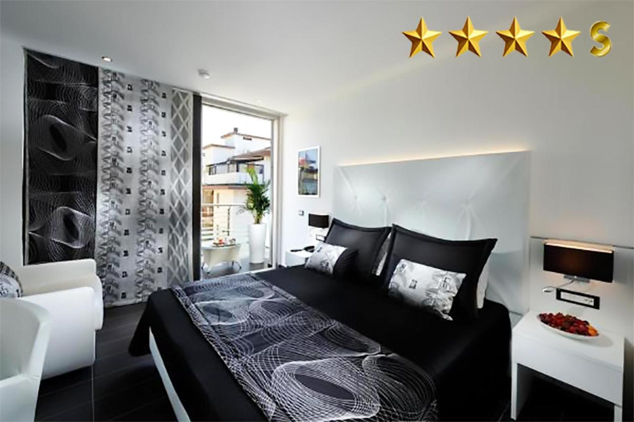 Hotel Rossini 4S Линяно Сабиадоро Екстериор снимка