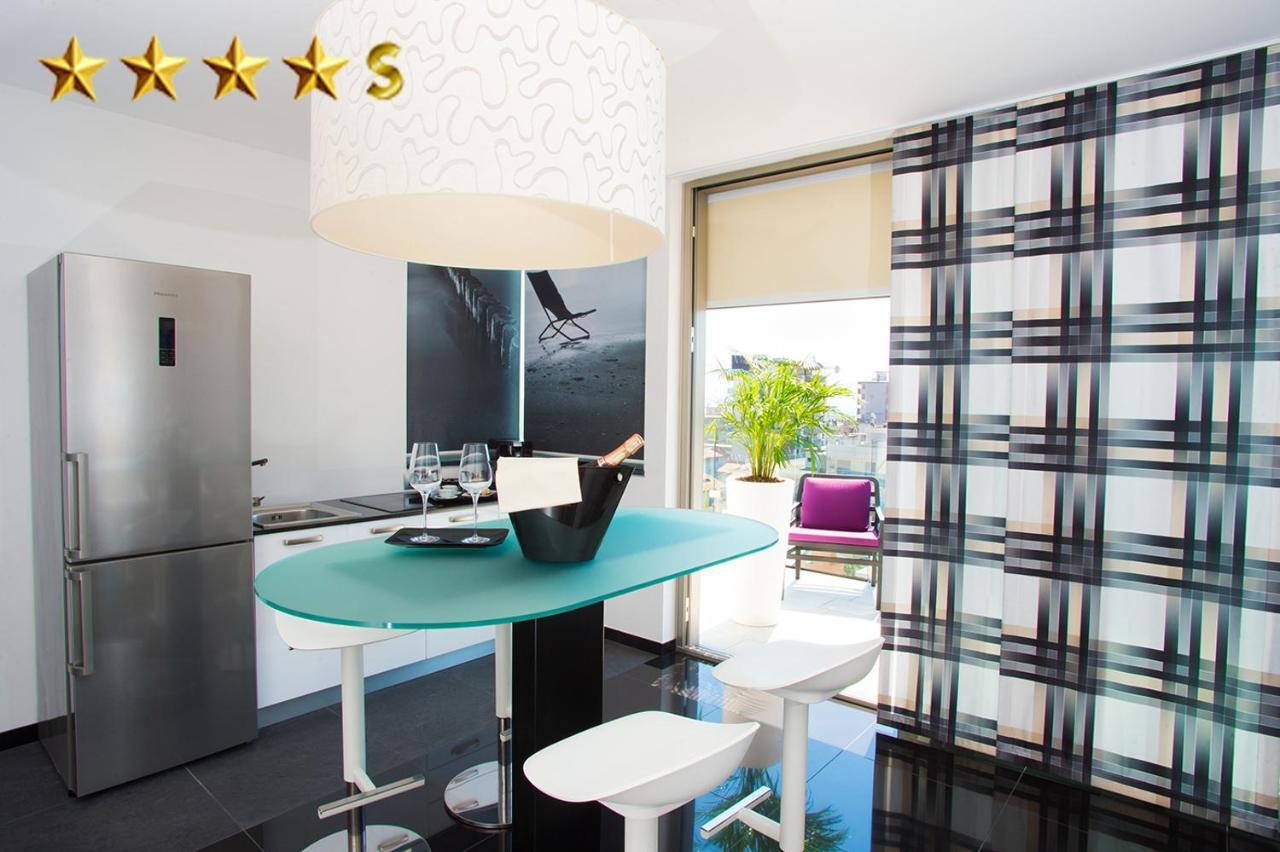 Hotel Rossini 4S Линяно Сабиадоро Екстериор снимка