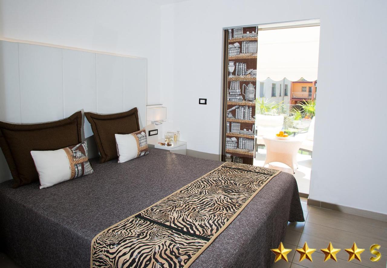 Hotel Rossini 4S Линяно Сабиадоро Екстериор снимка