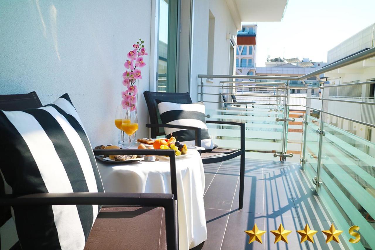 Hotel Rossini 4S Линяно Сабиадоро Екстериор снимка