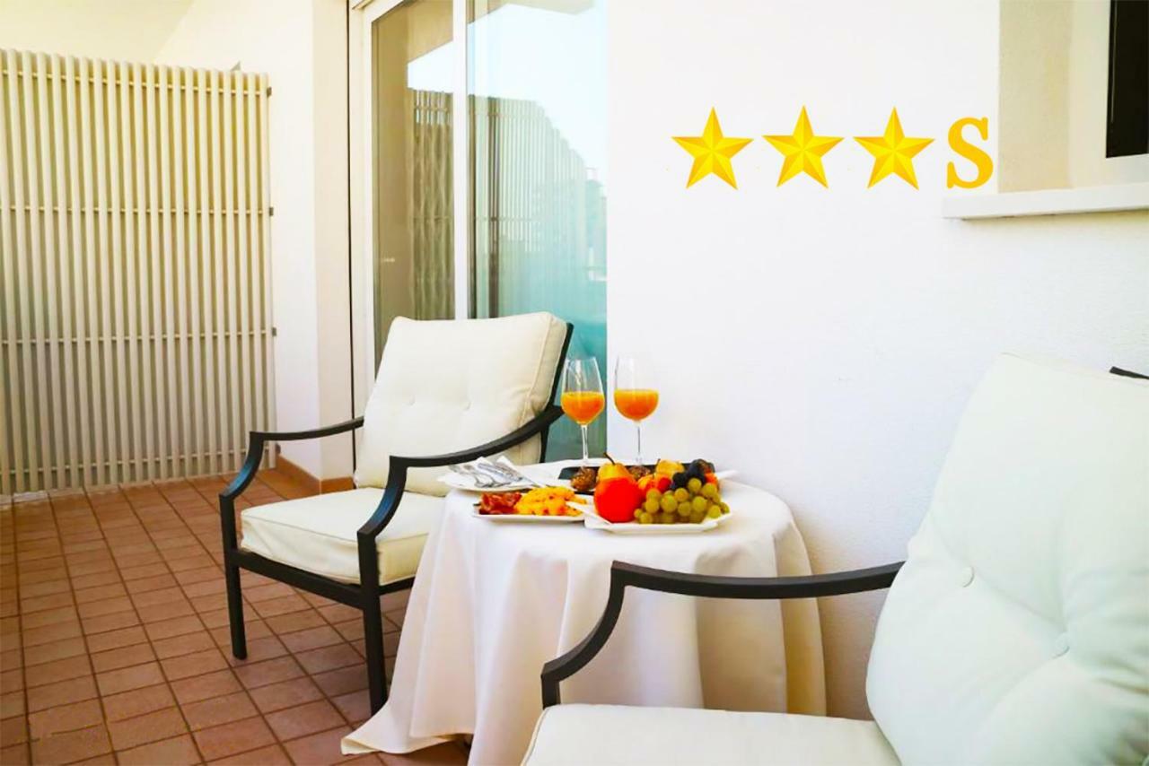Hotel Rossini 4S Линяно Сабиадоро Екстериор снимка
